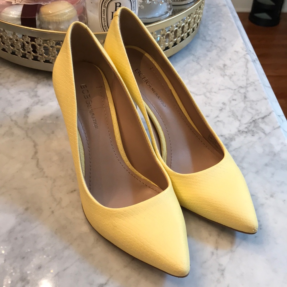 BCBG yellow pumps